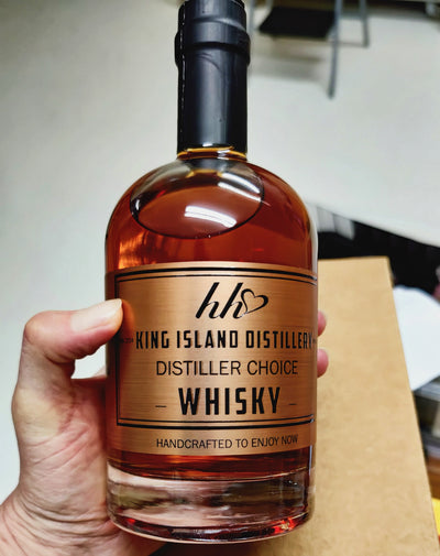 King Island Whisky held in hand